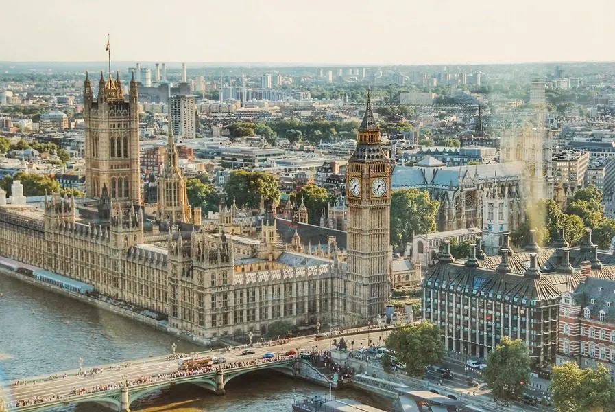 A view of the city from above, with big ben in the distance.